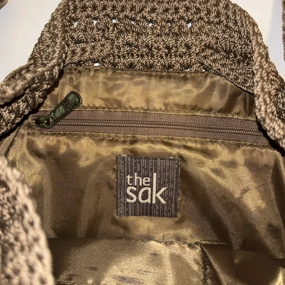 THE SAK TAUPE COLORED SMALL CROCHETED BAG NON ADJUSTABLE CROSSBODY STRAP